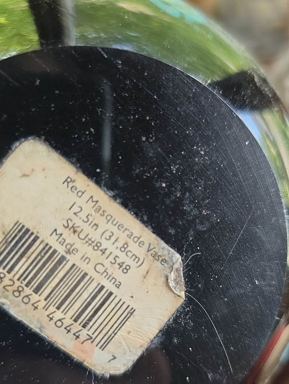 This striking vase appears to be a vintage mid-century Italian Murano
